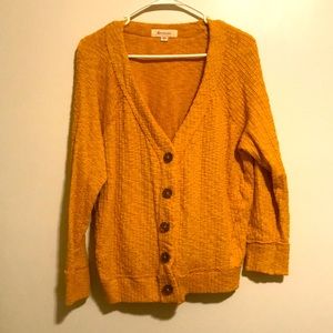 Mustard colored cable knit style cardigan tortoise shell buttons